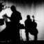 silhouette of musicians playing